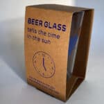 The beer glas with its package, the glas acts as a sundial