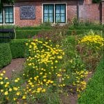 zonnewijzer graniet aan de muur