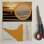 zonnewijzerkaart met schaar, klaar om te knippen